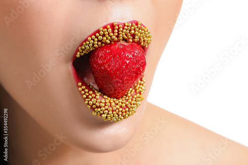 Sexy young woman with straw...