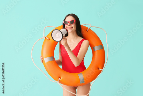 Beach rescuer with lifebuoy...