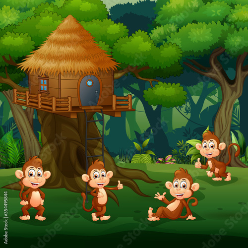 Scene with group of monkey playing at treehouse