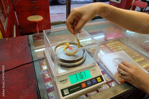Bracelet on a gold digital scale for pawn or sell at gold/pawn shop.