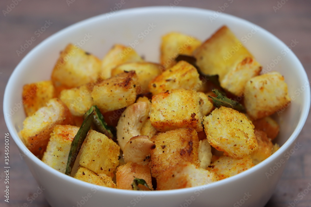 Bread upma, South Indian breakfast or snack made with letfover breads and spices, quick foods Bread upma, South Indian breakfast or snack made with letfover breads and spices, quick foods