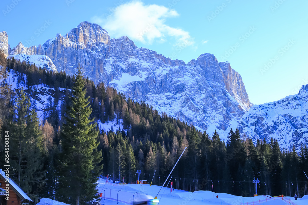Alleghe, Italy, 01/20/2020 , Piani di Pezzè, 1470 meters above sea level, gives immediate access to the ski Civetta area and is the ideal starting point to explore the Civetta massif. - obrazy, fototapety, plakaty 