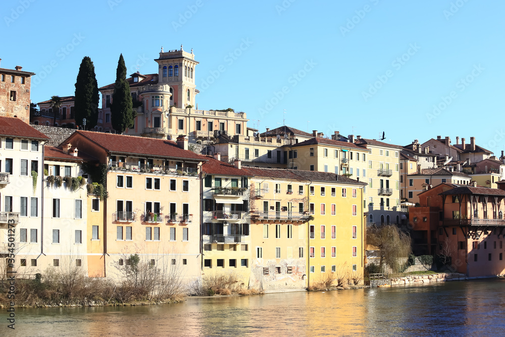 bassano del grappa, Italy, 02/06/2020 , View of the city from the river at sunset.
