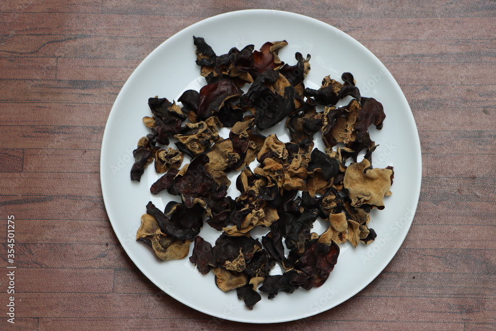 Dry wood ear mushroom or cloud ear mushroom, delicacy of Sikkim, India Dry wood ear mushroom or cloud ear mushroom, delicacy of Sikkim, India