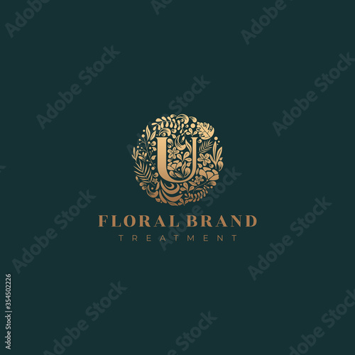 Letter U golden luxurious circle floral decorative logo