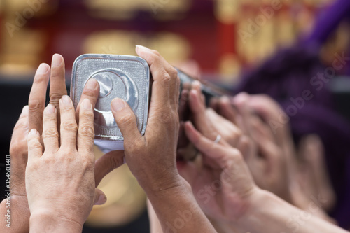 Photography Chiba, Japan, 08/22/2019 , Hands of the participants of the 893rd Myoken Big Fes