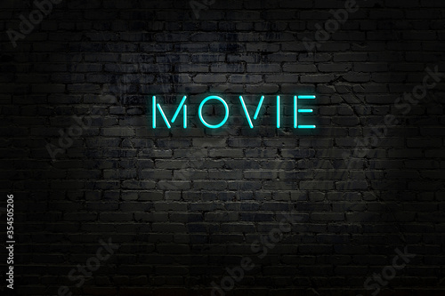 Foto Night view of neon sign on brick wall