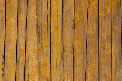 Obraz na płótnie Texture of a yellow fence made of wooden boards w salonie