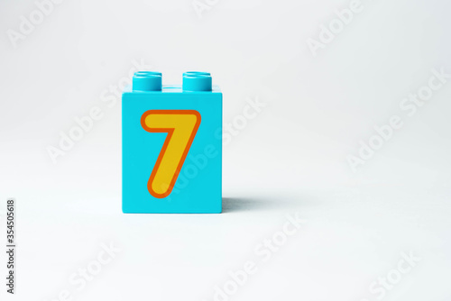 the number seven written on the block from the children's constructor