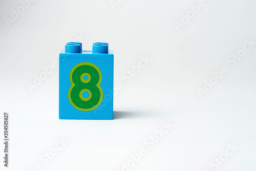 the number eight written on the block from the children's constructor