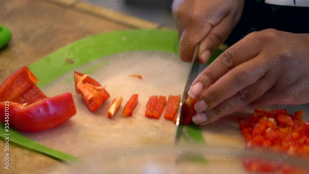 Cutting Red Bell Pepper With A Sharp Knife - slowmo