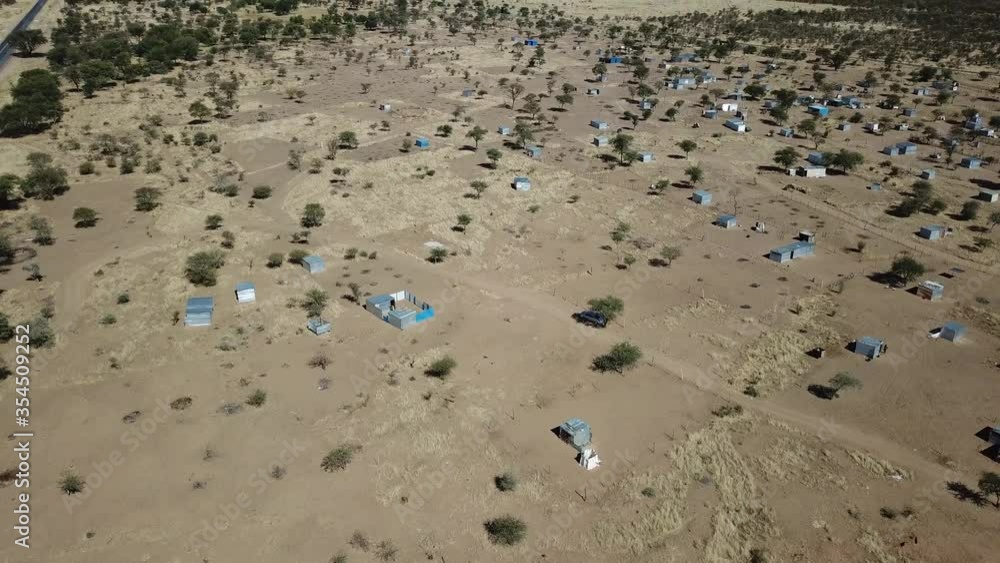 4K aerial drone video of Karibib, a small town in Erongo Mountains at B1 highway to west coast of Namibia and its township on hot sunny day in Erongo Region, central Namibia 4K aerial drone video of Karibib, a small town in Erongo Mountains at B1 highway to west coast of Namibia and its township on hot sunny day in Erongo Region, central Namibia