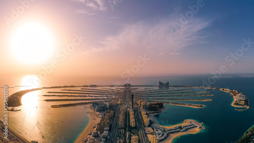 aerial view of Palm Jumeirah islands at sunset in Dubai photo