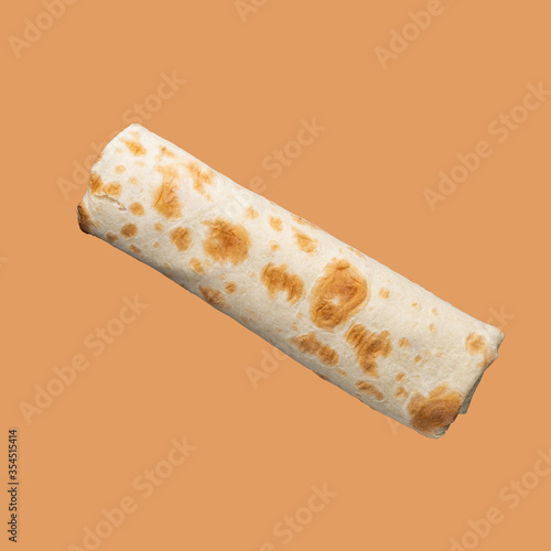 Flat top view of Arabic wrap pita bread, isolated on color background