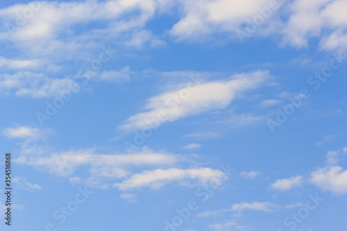 beautiful white cloudy on blue sky background at noon in Thailand © Kriangsak