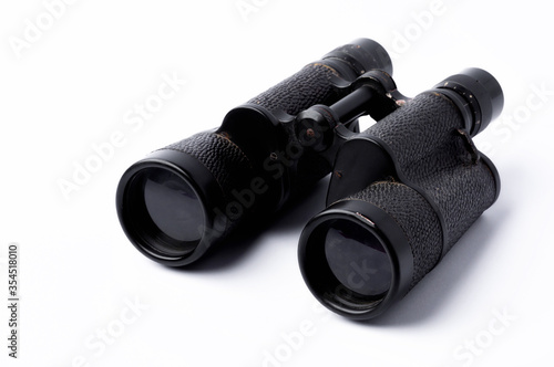 Black binoculars on white background