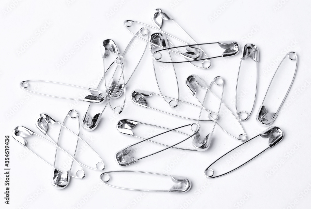 Fototapeta premium Safety pin on a white background
