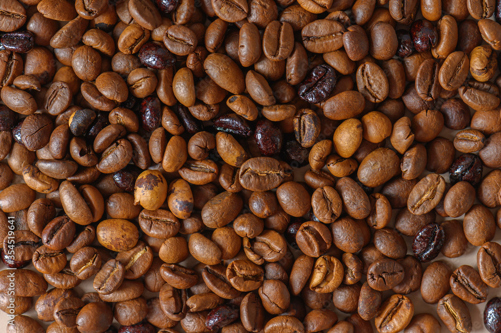 Coffee beans texture high quality background. Roasted coffee beans. Mixture of different kinds of roasted coffee beans background. Coffee beans texture high quality background. Roasted coffee beans. Mixture of different kinds of roasted coffee beans background.
