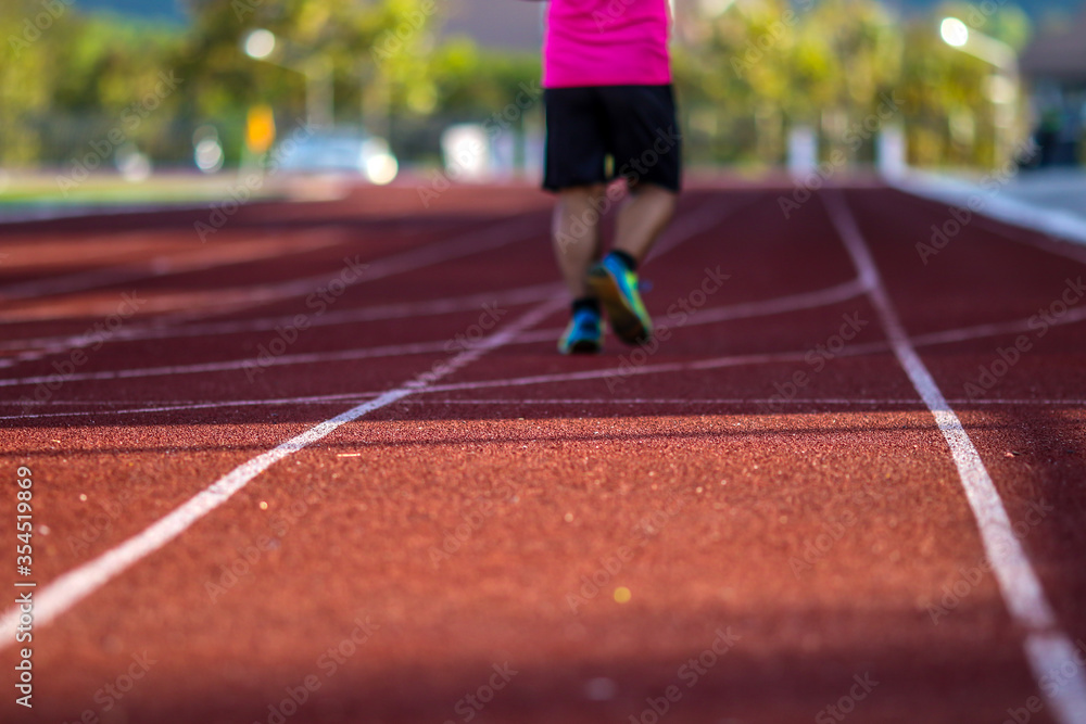 Fototapeta premium Red running sport track background and texture. Sport running track concept.