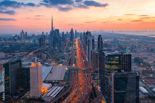 Tableau sur toile Aerial view of Dubai skyline showing rush hour traffic during sunset