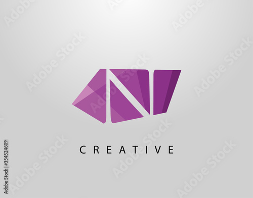 Letter N Abstract Gem Stone Logo. Creative N letter design with polygonal purple color on abstract stone shapes.