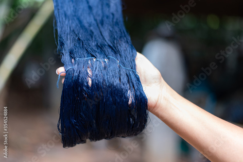 art, hand, background, blue, closeup, cloth, clothes, clothing, color, colorful, cotton, craft, culture, design, dye, dyed, dyeing, dying, fabric, fashion, fiber, hand, hand holding, handmade, indigo, photo