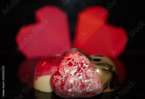 chocolate bonbons with origami hearts 