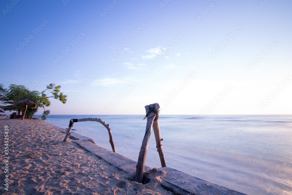 Enjoying a sunrise at a beach on Gili Meno on Bali Indonesia Enjoying a sunrise at a beach on Gili Meno on Bali Indonesia