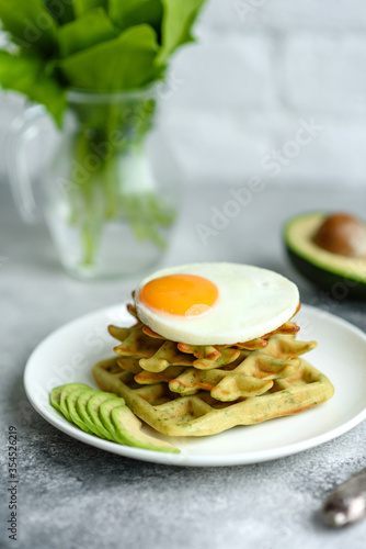 Fresh delicious and nutritious breakfast with waffles with spinach