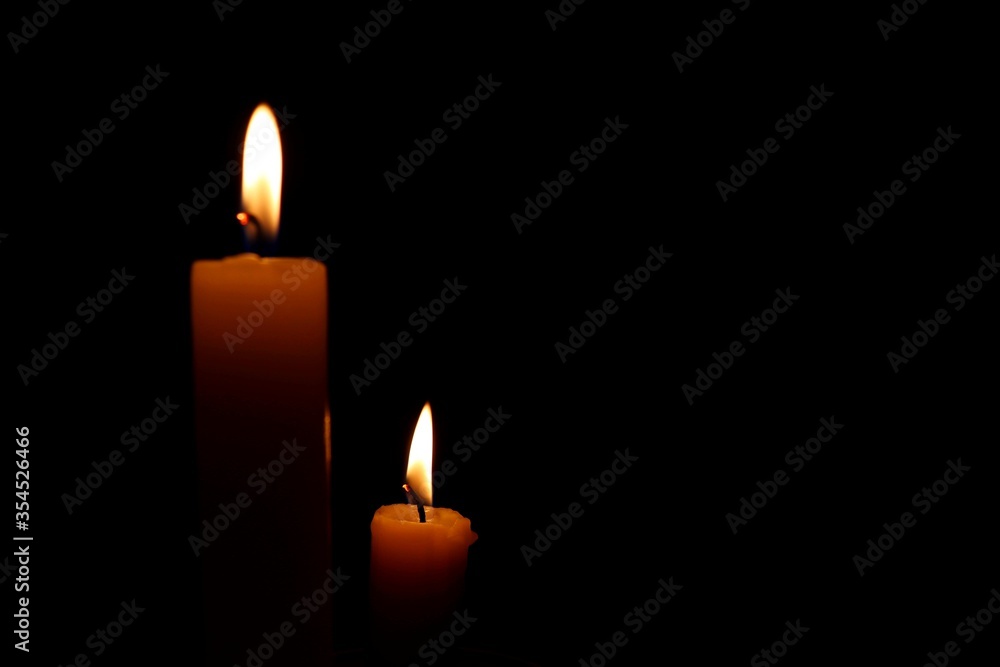 Candle black background of mourning funeral moment of silence Candle black background of mourning funeral moment of silence