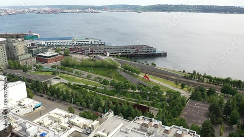 Aerial / drone footage of the Olympic Skulpture Park of the Seattle Art Museum near the Cruise Terminal  without people downtown, in the commercial district of Seattle, Washington during the pandemic photo