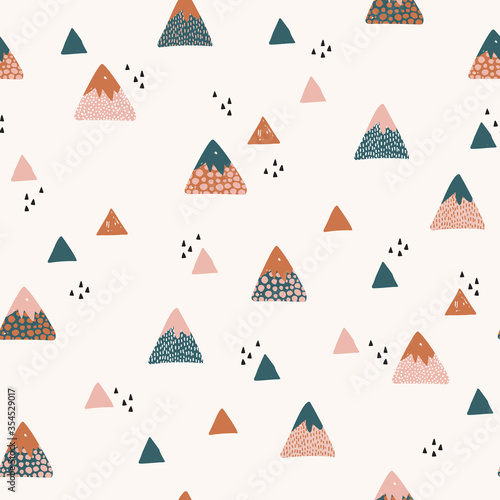 Abstract mountains seamless pattern. Cute geometric and doodle mountain background.