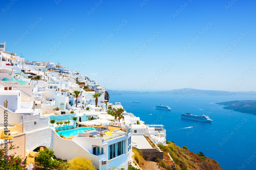 White architecture and blue sea on Santorini island, Greece. Panoramic view. Famous travel destination