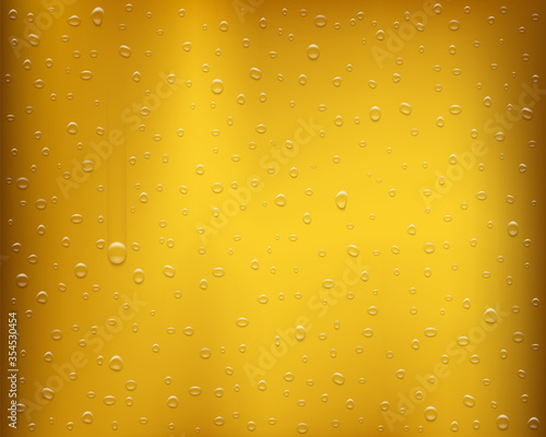 Drops of condensate on a glass with beer or juice.