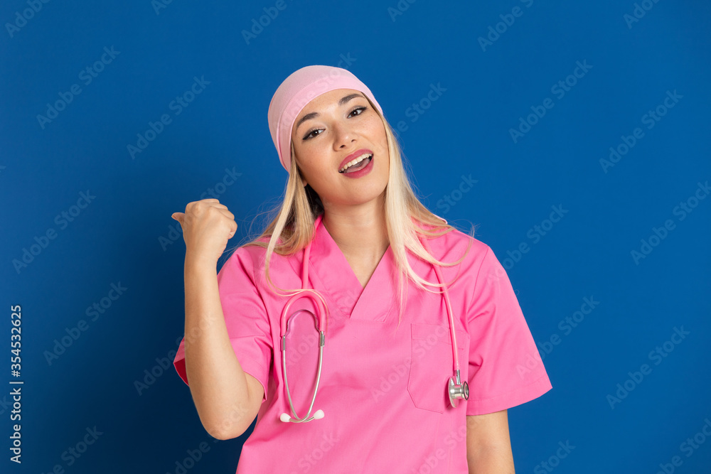 Young doctor with a pink uniform and a scarf Young doctor with a pink uniform and a scarf