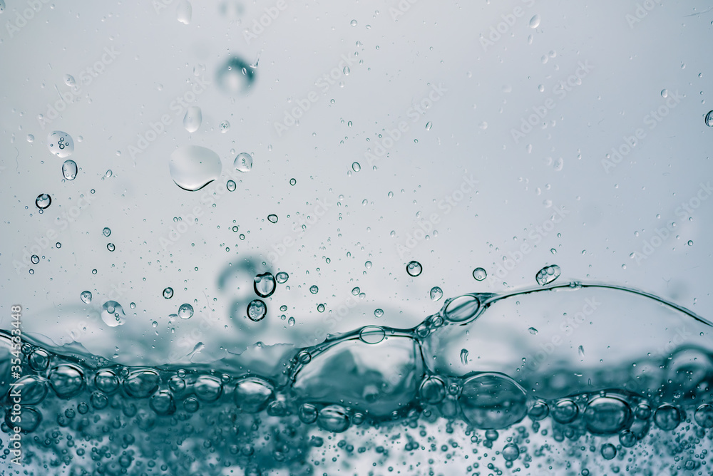 Background of close-up soda bubbles or pure water on white background. Background of close-up soda bubbles or pure water on white background.