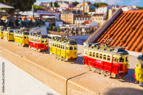 Small colorful toy tramways, copies of Lisbon tram, Lisbon souvenir, symbol, Portugal