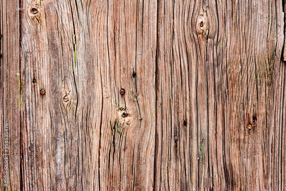 Wooden texture with scratches and cracks. It can be used as a background Wooden texture with scratches and cracks. It can be used as a background