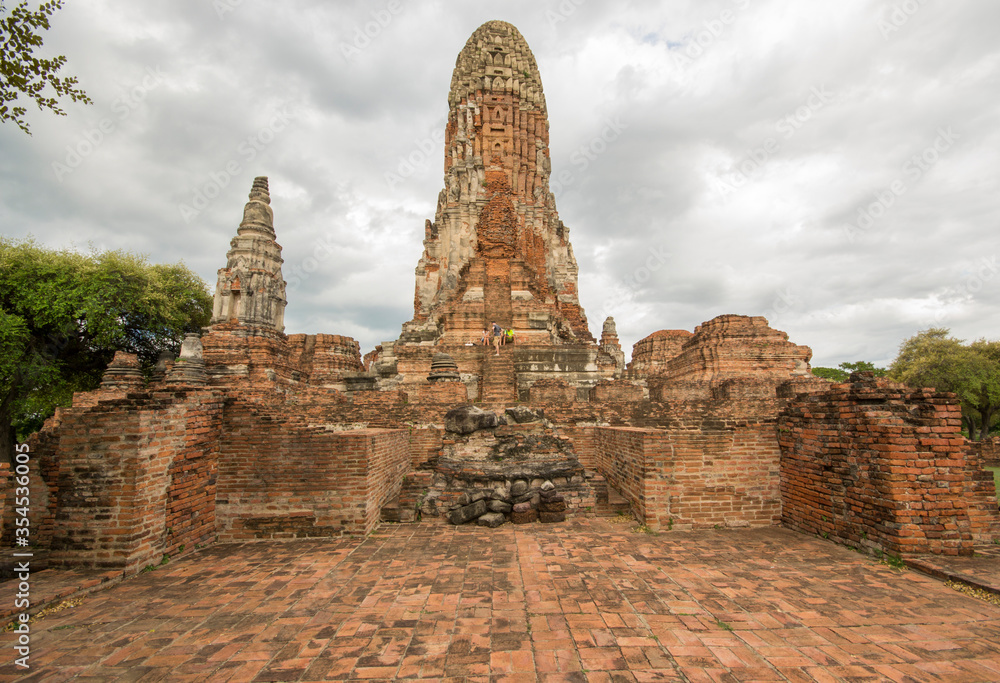 Ayutthaya, Thailand - August 23th 2015: Ayutthaya is the former capital of Phra Nakhon Si Ayutthaya province in Thailand. In 1767, the city was destroyed by the Burmese army. Ayutthaya, Thailand - August 23th 2015: Ayutthaya is the former capital of Phra Nakhon Si Ayutthaya province in Thailand. In 1767, the city was destroyed by the Burmese army.