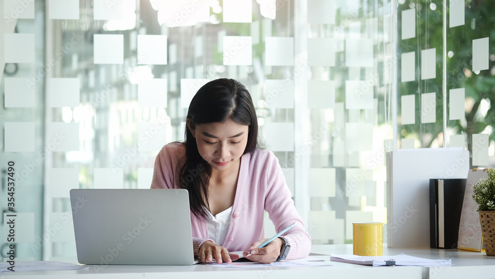 Business working in office with documents and laptop people Consulting and business planning. Business working in office with documents and laptop people Consulting and business planning.