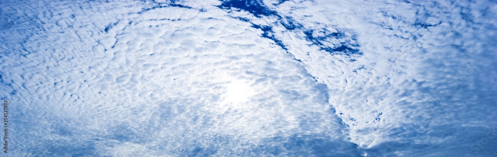 Fototapeta premium Panorama sky background with tiny clouds.