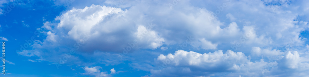 Obraz premium Panorama blue sky background with tiny clouds.