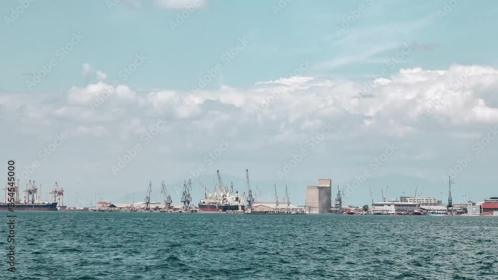 Pan shot of Port and Cranes timelapse of Thessaloniki Harbor