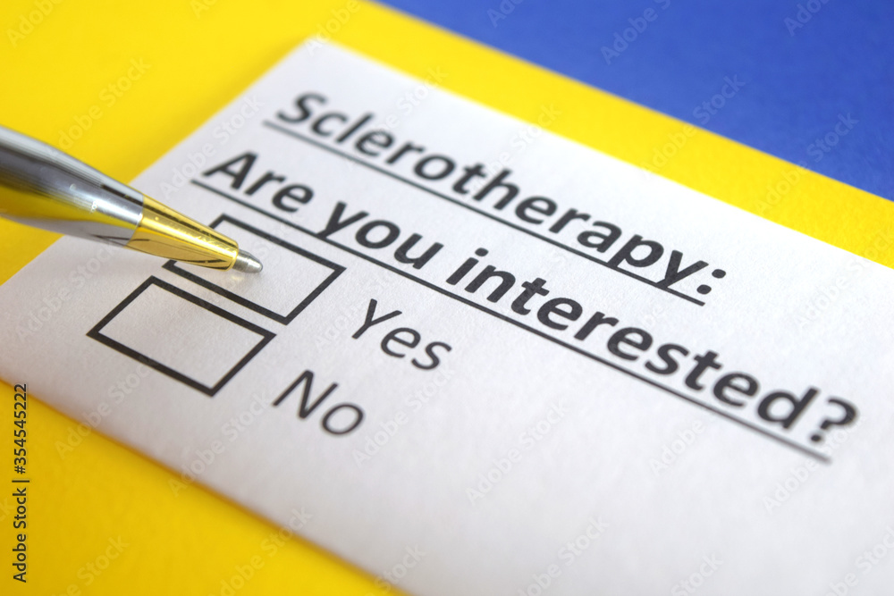 One person is answering question about sclerotherapy. One person is answering question about sclerotherapy.