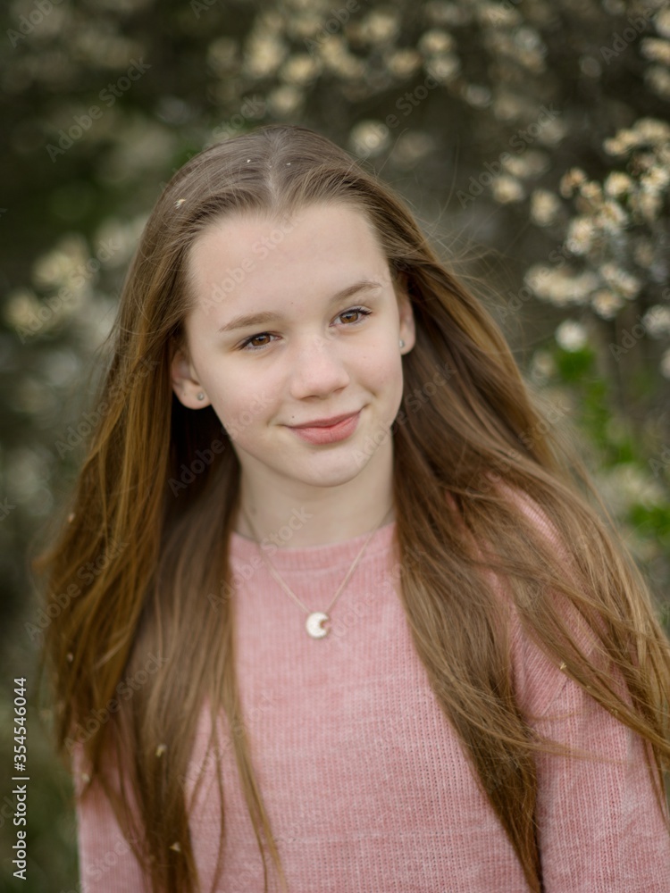Young teenage teen girl in nature in the countryside summer portrait. Young teenage teen girl in nature in the countryside summer portrait.