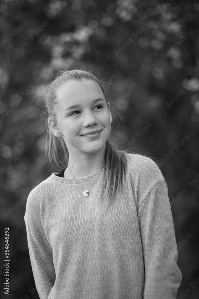 Young teenage teen girl in nature in the countryside summer portrait. Young teenage teen girl in nature in the countryside summer portrait.