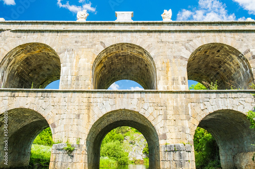 Croatia  beautiful 19 century stone bridge with arches in Tounj on Tounjcica river