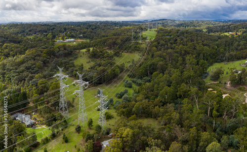 Quadro su tela Aerial view of power pylons receding into the distance in the Melbourne Australi