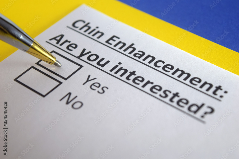 One person is answering question about chin enhancement. One person is answering question about chin enhancement.
