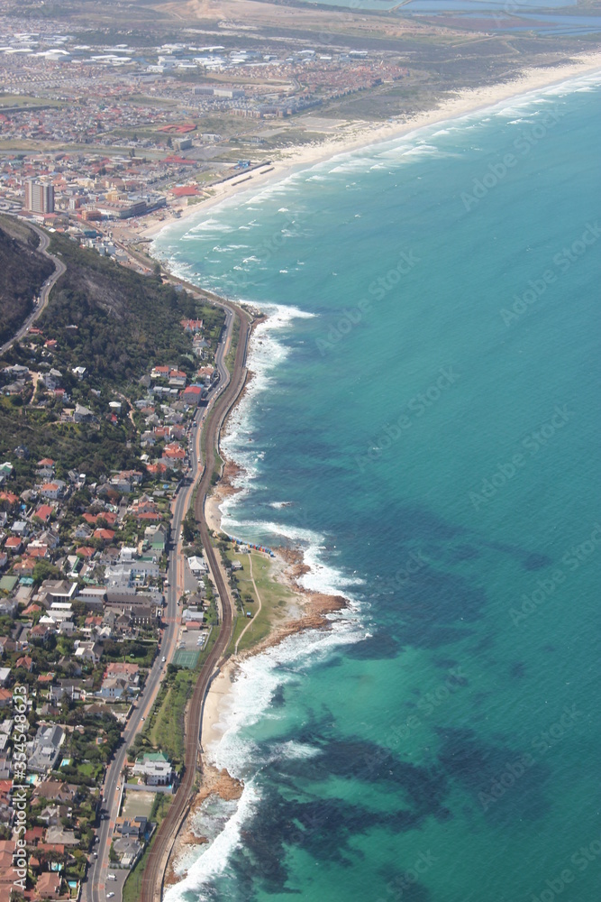 Aerial shot of sea and road